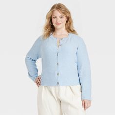 Experience ultimate comfort in our Cozy Knit Button-Front Cardigan from Universal Thread™. Made of recycled polyester with added acrylic and spandex, this front button-down cardigan features a crew neckline for a classic look. Tailored in regular fit, this mid length cardigan has long sleeves and ribbed cuffs for a snug fit. Universal Thread™: Found exclusively at Target. Light Blue Cardigan, Flowy Cardigans, Boyfriend Cardigan, Soft Cardigan, Button Front Cardigan, Blue Cardigan, Cozy Knit, Matching Family Outfits, Family Outfits