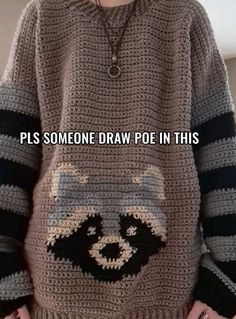 a person wearing a raccoon sweater with the words plls someone draw poop in this