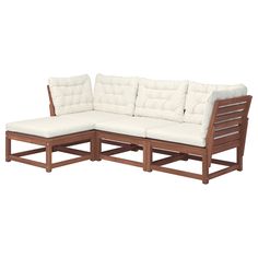 a wooden couch with white cushions on it's back and side ends, sitting against a white background