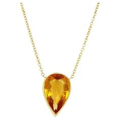 This necklace is crafted in 18-karat white gold and showcases a gorgeous pear-shaped citrine weighing approximately 4.00 carats. The citrine has a warm golden orange color and is elegantly set in a high polish bezel made of 18K yellow gold. It's a stunning and cheerful piece that adds a touch of elegance to any look, perfect gift or wardrobe addition. The pendant and necklace weigh in at 4.2 grams. Designed and created by Gems Are Forever, Inc. Beverly Hills Metal: 18K Yellow Gold Chain Length: Pear Shaped Pendant, Yellow Gold Chain, Bezel Setting, Pear Shaped, Chain Lengths, Chain Length, Beverly Hills, Gold Chain, Citrine