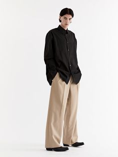 Editor's Notes Made from wool-blend, these contemporary trousers have wide legs with deep front tucks. Sleek and neat silhouette makes a refined look.- Zip and hook fastening- Two front slash pockets- Front tucks- Wide fitMeasurements (in.) M / L- Total Length: 42.5 in. / 42.7 in. - Rise: 11.0 in. / 11.2 in. - Waist: 15.6 in. / 16.5 in.  - Thigh: 14.8 in. / 15.0 in.- Hem: 11.0 in. / 11.2 in.   Model Info: Height 6' 1.2, Bust 36.6, Waist 28.0, Hip 34.6Composition & Care- 50% Wool, 50% Polyester- Recommend dry clean- Hand wash at 86°FDesigner- by Theballon MEN Wide Leg Trousers Outfit Men, Wide Leg Pants Outfit Men, Trousers Outfit Men, Thanksgiving Fit, Wide Leg Trousers Outfit, Baggy Dresses, Wide Leg Pants Outfit, Pants Outfit Men, Trouser Outfit