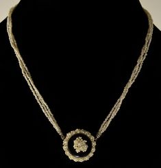 "Rare 3-strand seed pearl necklace C. 1800 - 1830's. The main attraction of the necklace is front push-in clasp. It is made of seed pearl wreath wrapped around polished black onyx dome with seed pearl bouquet in the center. The back and the clasp's tongue are made of 14K gold (tested). The necklace is made of 3 strands of glittering seed pearls. It is 17\" around neck. The clasp is approx. 1\" diameter. The necklace weighs 11.7 grams. Very good antique condition." Antique Pearl Necklace For Formal Occasions, Antique Pearl Chain Jewelry For Formal Occasions, Victorian Pearl Necklace For Formal Occasions, Victorian Style Formal Pearl Necklace, Victorian Pearl Necklace With Pearl Pendant, Victorian Pendant Jewelry For Opera, Antique Round Necklace With Rose Cut Diamonds, Victorian Style Pearl Chain Jewelry, Antique Beaded Jewelry For Formal Occasions