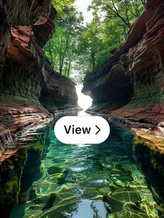 an image of a river in the middle of some rocks with water flowing through it