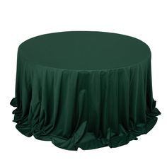 a green round table with ruffles on the top and bottom, sitting in front of a white background