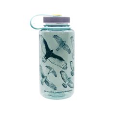 a glass jar with an image of birds on it