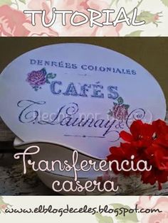 a sign that is on top of a table with flowers in front of it and the words transferencia casera