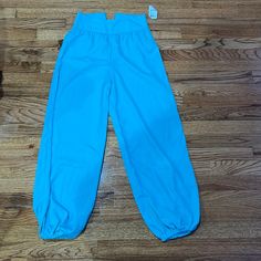 Never Worn Excellent Condition Comfy And Cute Pants Blue High Waist Stretch Parachute Pants, Stretch High Waist Blue Parachute Pants, Blue Stretch Parachute Pants For Summer, Blue Ankle-length Pull-on Pants, Blue Bottoms With Elastic Waistband And Loose Fit, High Waist Pull-on Loungewear Pants, High Waist Pull-on Lounge Pants, Solid High Waist Yoga Pants For Spring, Blue Stretch Harem Pants For Spring