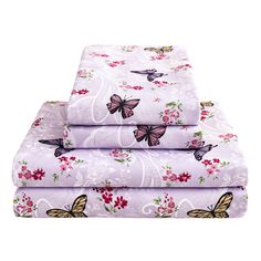 three sheets with butterflies on them in purple and pink colors, one is folded over the other