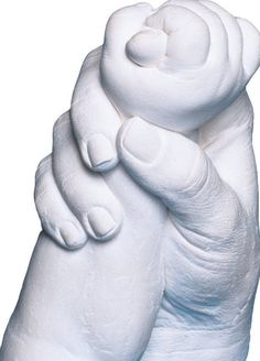 there is a white bear statue holding it's paw