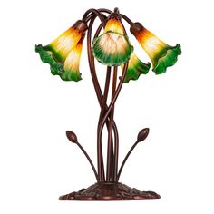 a lamp that has three flowers on it