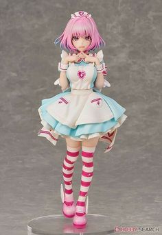 a figurine is posed on a clear base with pink hair and white dress