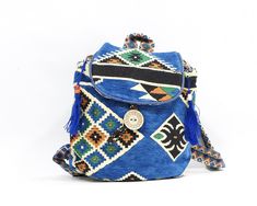 "1980s Beautiful backpackTurkish vintage deadstock * Colorful woven tapestry * Adjustable straps * Front flap * Top drawstring closure * Small zipper pocket inside BRAND: No brand ORIGIN: Made in Turkey MATERIAL: Traditional woven tapestry, synthetic swede. CONDITION: Great Condition (new, never used, vintage old stock, originally from the 1980s) MEASUREMENTS (measured flat) Height: 12\" Width: 13\" (at widest point) Deep: 5.5\" Strap: adjustable NOTE: The beauty of native textiles comes from th Handmade Vintage Backpack, Beautiful Backpacks, Tapestry Bag, Woven Tapestry, Gold Belts, Kilim Woven, Fabric Belt, Silk Kimono, Tapestry Weaving