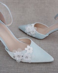 Classic satin pointy toe heels adorned with white flower appliques. Sleek and glamour is a great combination and will definitely be a favorite. DETAILS: HEELS: 3 inches COLORS AVAILABLE: Dusty Pink, Light Blue, and White UPPER: Synthetic upper and lining MATERIALS: Mandmade outsole ORIGIN: Imported STYLE NAME: BELL Light Blue Wedding Shoes, Pastel Blue Wedding, Makeup Backgrounds, Blue Satin Heels, Light Blue Shoes, Evening Heels, Light Blue Wedding, Wedding Pumps, Prom 2024