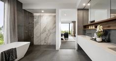 a modern bathroom with marble walls and flooring