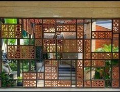 an open window with wooden lattices in the middle and stairs leading up to it