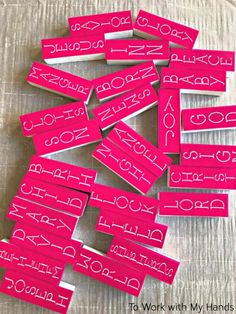 pink stickers with words written on them