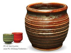 there is a large brown vase next to two smaller red and one green bowls on the same side