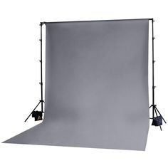 a gray backdrop with two light stands