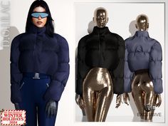 two mannequins wearing shiny gold pants and blue jackets, one in black and the other in silver