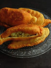 two pieces of fried food on a plate