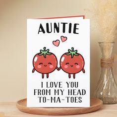 a card with two tomatoes on it and the words, i love you from my head to ma - toes