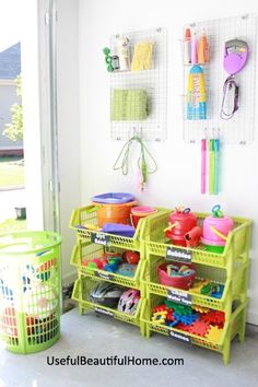 an image of a small room with toys on the shelves and other items in baskets