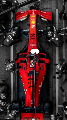 the top view of a red race car from above