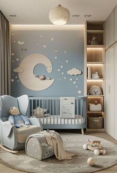 a baby's room with blue walls and white furniture