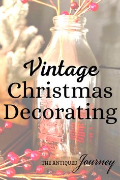 an old fashioned christmas decoration bottle with red berries in it and the words vintage christmas decor