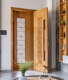 a living room filled with furniture and wooden shelves