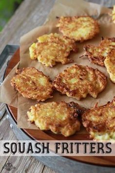 some fried food is on a plate with the words squash fritters