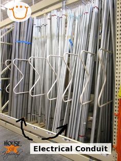 an electrical conduit is being installed in a warehouse or office building with the words house electric conduit above it