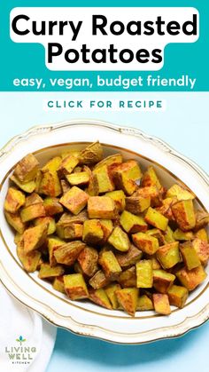 a white bowl filled with cooked potatoes on top of a blue table