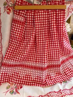 This 1960's apron is so pretty and made for all occasions with simple red and white. The fine work of embroidery is exceptional, the pleating's in the waist are so well made, with embroidered stars on each one. The pocket is very usable with the same detail as the rest of the apron. The length is 20 1/2 " x 70" W from the end of the waist tie to the opposite end of the waist tie. I hope I explain this well enough....If you have questions, please reach out to me, I am here for you. Embroidered Stars, Chicken Scratch, I Am Here, Nov 1, Linen Apron, Dining Linens, Waist Tie, Apron, The End