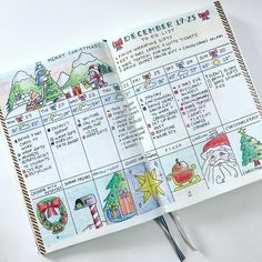 an open christmas planner on a white surface