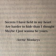 an old book with the words arctic monkeys written in black and white on top of it