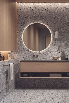 a bathroom with a sink, mirror and towel rack in it's center area