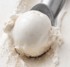 a scoop of ice cream sitting on top of a table