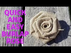 a close up of a flower on top of a wooden surface with the words quick and easy burlap rose