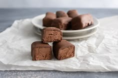 three pieces of chocolate cake on a plate