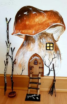 a painting of a mushroom house on the wall