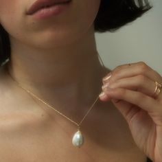 A single luminous Japanese freshwater pearl, of striking proportions. A pearl punctuation mark to wear throughout the seasons. Natural Pearl Jewelry, Ivory Soap, Wax Carving, Pearl Charms, Gifts For Wedding Party, The Seasons, Punctuation, Natural Pearls, Beauty Shop