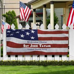 an american flag is on display in front of a white picket fence with the words star - spane tavern