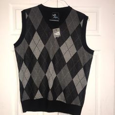 Brand New V-Neck Vest. Argyle Pattern Of Dark, Medium, & Light Gray With White & Black Stitching Separating The Different Colors. The Back Is Solid Black. Sz L. Gray Fitted V-neck Sweater Vest, Black Cotton V-neck Tank Top, Black V-neck Vest For Winter, Gray Cotton Sleeveless Sweater Vest, Dark Sweater, Argyle Vest, Blue Cashmere Sweater, Black Quarter Zip, Argyle Sweater Vest