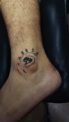 a person with a tattoo on their foot