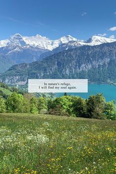 a scenic view of the mountains and water with a quote written on it that reads in nature's refuge i will find my soul again again