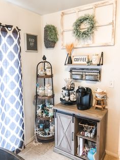 the coffee bar is decorated with wreaths and other things to decorate on top of it