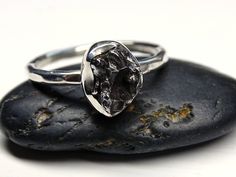 silver meteorite ring, meteorite engagement ring, silver ring meteorite, meteorite promise ring shooting star celestial jewelry gift for her // Delicate engagement ring with a solid, genuine meteorite. // Wonderful as an engagement ring, a unique gift for a special someone or just to keep for yourself. // You can combine this ring perfectly with other rings as a stacking ring or wear at as a single highlight on your hand. > genuine iron meteorite (Campo del Cielo) > 2mm wide hammered ring Meteorite Engagement Ring, Labradorite Ring Silver, Engagement Ring Silver, Star Celestial, Delicate Engagement Ring, Meteorite Jewelry, Iron Meteorite, Hammered Silver Ring, Meteorite Ring