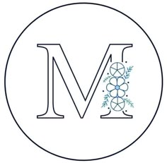 the letter m with grapes and leaves on it's side in a blue circle