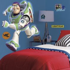 the buzz lightyear wall decal is in this bedroom